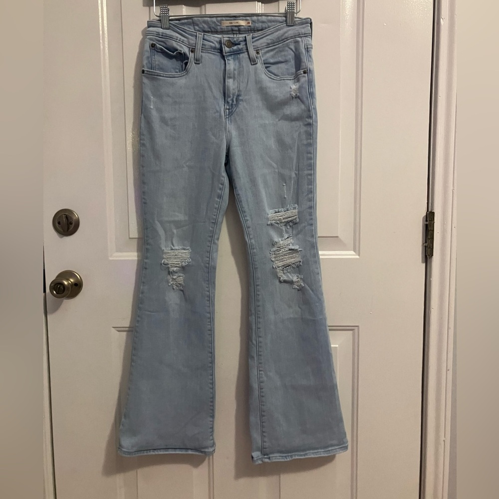 Levi’s 726 flare light -wash, distressed jeans